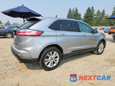Trzecie zdjęcie samochodu z tyłu: 2022 FORD EDGE TITANIUM VIN:2FMPK4K97NBA39536 - miniatura