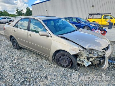 Czwarte zdjęcie samochodu z boku: 2002 TOYOTA CAMRY LE VIN:4T1BE32K72U554895 - miniatura