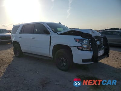 Czwarte zdjęcie samochodu z boku: 2019 CHEVROLET TAHOE POLICE VIN:1GNLCDEC1KR357269 - miniatura