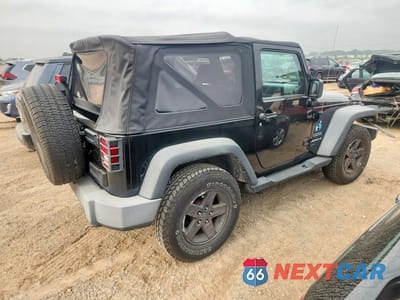 Trzecie zdjęcie samochodu z tyłu: 2010 JEEP WRANGLER SPORT VIN:1J4AA2D13AL146323 - miniatura