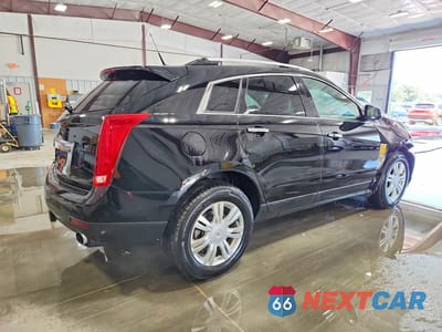 Trzecie zdjęcie samochodu z tyłu: 2011 CADILLAC SRX LUXURY COLLECTION VIN:3GYFNAEY1BS668542 - miniatura