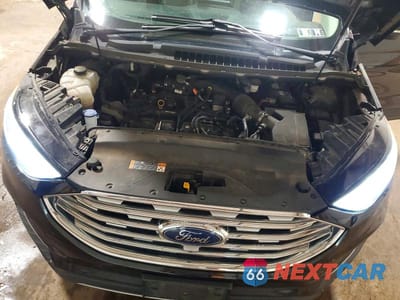 Zdjęcie 11 z 12 samochodu: 2022 FORD EDGE TITANIUM VIN:2FMPK4K91NBA53416 - miniatura