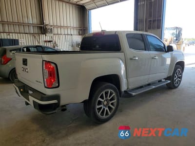 Trzecie zdjęcie samochodu z tyłu: 2019 GMC CANYON DENALI VIN:1GTG5EENXK1153273 - miniatura