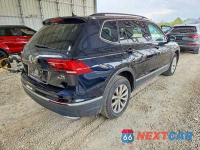 Trzecie zdjęcie samochodu z tyłu: 2018 VOLKSWAGEN TIGUAN SE VIN:3VV2B7AX9JM100203 - miniatura