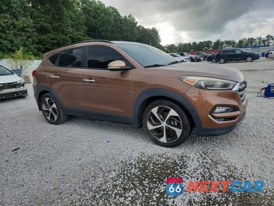 Czwarte zdjęcie samochodu z boku: 2016 HYUNDAI TUCSON LIMITED VIN:KM8J33A20GU076961 - miniatura