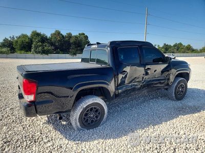 Trzecie zdjęcie samochodu z tyłu: 2016 TOYOTA TACOMA SR V6 VIN:3TMCZ5AN3GM013875 - miniatura