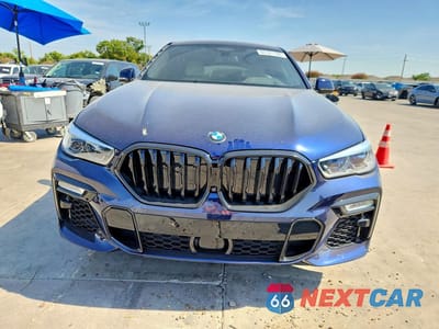 Piąte zdjęcie samochodu w środku: 2021 BMW X6 M50I VIN:5UXCY8C03M9D78381 - miniatura