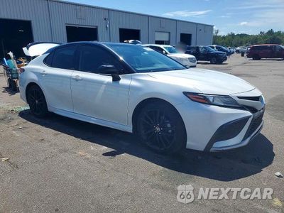 Czwarte zdjęcie samochodu z boku: 2022 TOYOTA CAMRY XSE VIN:4T1K61AK0NU002016 - miniatura
