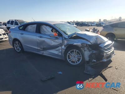 Czwarte zdjęcie samochodu z boku: 2016 FORD FUSION SE HYBRID VIN:3FA6P0LU0GR316289 - miniatura