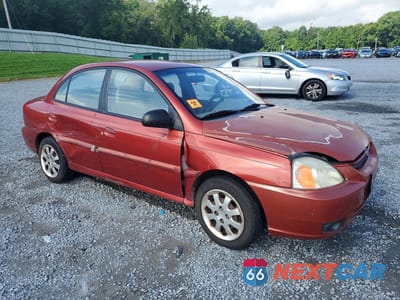Czwarte zdjęcie samochodu z boku: 2003 KIA RIO BASE VIN:KNADC125736211458 - miniatura
