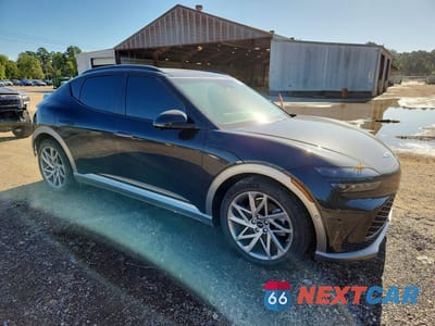 Czwarte zdjęcie samochodu z boku: 2024 GENESIS GV60 ADVANCED VIN:KMUKCDSC4RU022388 - miniatura