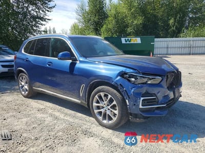 Czwarte zdjęcie samochodu z boku: 2023 BMW X5 XDRIVE40I VIN:5UXCR6C04P9R12619 - miniatura