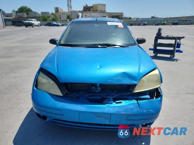 Piąte zdjęcie samochodu w środku: 2007 FORD FOCUS ZX5 VIN:1FAFP37N47W307113 - miniatura