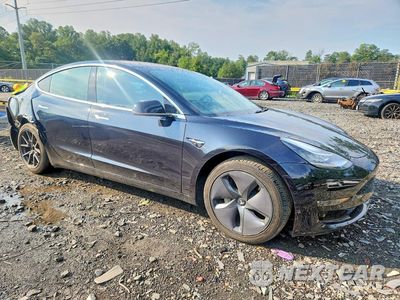 Czwarte zdjęcie samochodu z boku: 2018 TESLA MODEL 3 VIN:5YJ3E1EB3JF095011 - miniatura