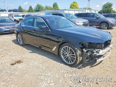 Czwarte zdjęcie samochodu z boku: 2018 BMW 530 XI VIN:WBAJA7C5XJWC77092 - miniatura