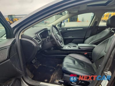 Zdjęcie 7 z 12 samochodu: 2019 FORD FUSION TITANIUM VIN:3FA6P0K91KR269439 - miniatura