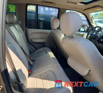 Zdjęcie 10 z 12 samochodu: 2003 JEEP LIBERTY LIMITED VIN:1J4GL58K43W577473 - miniatura
