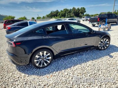 Trzecie zdjęcie samochodu z tyłu: 2025 TESLA MODEL 3 VIN:5YJ3E1EB0SF062937 - miniatura