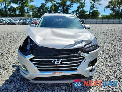 Piąte zdjęcie samochodu w środku: 2021 HYUNDAI TUCSON LIMITED VIN:KM8J33AL2MU354909 - miniatura