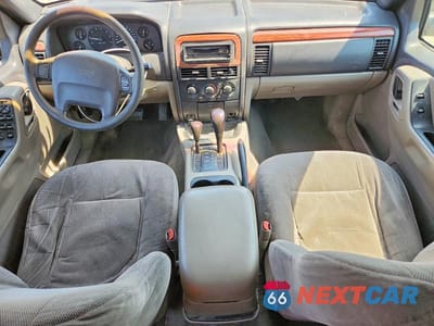 Zdjęcie 8 z 13 samochodu: 1999 JEEP GRAND CHEROKEE LAREDO VIN:1J4GW58S9XC682248 - miniatura