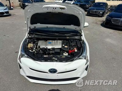 Zdjęcie 9 z 10 samochodu: 2018 TOYOTA PRIUS ONE VIN:JTDKBRFU9J3060117 - miniatura