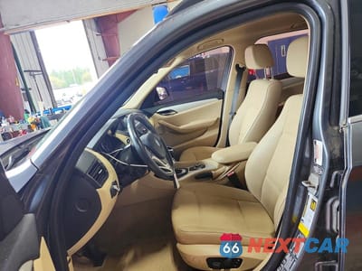 Zdjęcie 7 z 13 samochodu: 2013 BMW X1 XDRIVE28I VIN:WBAVL1C54DVR83099 - miniatura