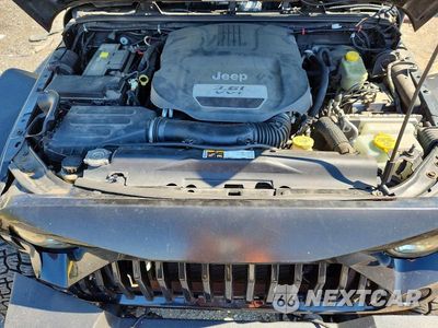Zdjęcie 11 z 12 samochodu: 2013 JEEP WRANGLER UNLIMITED SAHARA VIN:1C4BJWEG2DL508778 - miniatura
