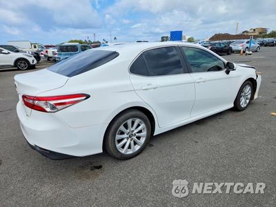 Trzecie zdjęcie samochodu z tyłu: 2019 TOYOTA CAMRY L VIN:4T1B11HKXKU723329 - miniatura
