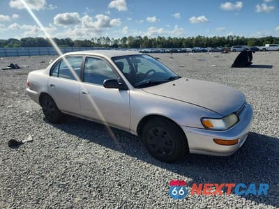 Czwarte zdjęcie samochodu z boku: 1994 TOYOTA COROLLA DX VIN:1NXAE09B2RZ193165 - miniatura