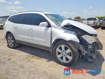 Czwarte zdjęcie samochodu z boku: 2016 CHEVROLET TRAVERSE LT VIN:1GNKRGKD6GJ300287 - miniatura