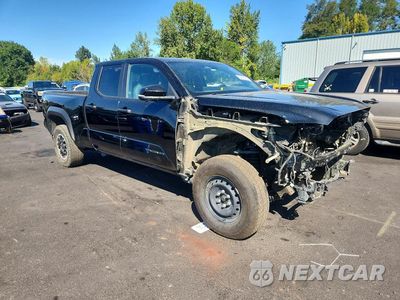Czwarte zdjęcie samochodu z boku: 2024 TOYOTA TACOMA TRD OFF-ROAD VIN:3TMLB5JN7RM063119 - miniatura