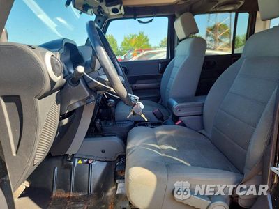 Zdjęcie 7 z 14 samochodu: 2009 JEEP WRANGLER UNLIMITED SAHARA VIN:1J4GA59109L769608 - miniatura
