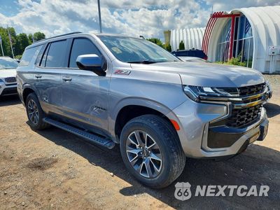 Czwarte zdjęcie samochodu z boku: 2022 CHEVROLET TAHOE K1500 Z71 VIN:1GNSKPKD5NR162034 - miniatura