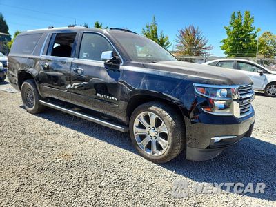 Czwarte zdjęcie samochodu z boku: 2017 CHEVROLET SUBURBAN K1500 PREMIER VIN:1GNSKJKC3HR284321 - miniatura