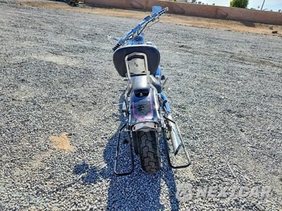 Czwarte zdjęcie samochodu z boku: 1990 HARLEY-DAVIDSON FXST CUSTOM VIN:1HD1BKL32LY024840 - miniatura