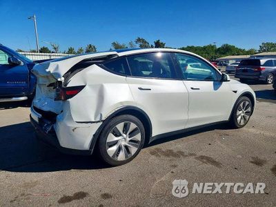 Trzecie zdjęcie samochodu z tyłu: 2022 TESLA MODEL Y VIN:7SAYGDEE9NF310945 - miniatura