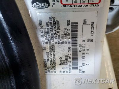 Zdjęcie 12 z 12 samochodu: 2012 FORD FIESTA S VIN:3FADP4AJ9CM208087 - miniatura