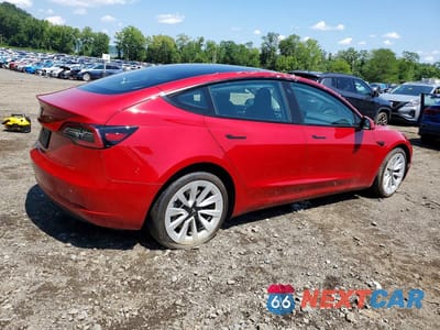 Trzecie zdjęcie samochodu z tyłu: 2023 TESLA MODEL 3 VIN:5YJ3E1EAXPF483935 - miniatura