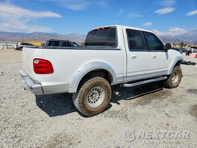 Trzecie zdjęcie samochodu z tyłu: 2002 FORD F150 SUPERCREW VIN:1FTRW08L62KA27764 - miniatura