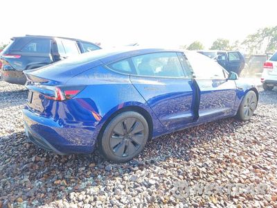 Trzecie zdjęcie samochodu z tyłu: 2024 TESLA MODEL 3 VIN:5YJ3E1EB5RF718575 - miniatura