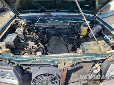 Zdjęcie 11 z 13 samochodu: 2000 HONDA PASSPORT EX VIN:4S6DM58W7Y4415366 - miniatura