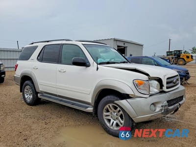 Czwarte zdjęcie samochodu z boku: 2003 TOYOTA SEQUOIA SR5 VIN:5TDBT44A03S157815 - miniatura