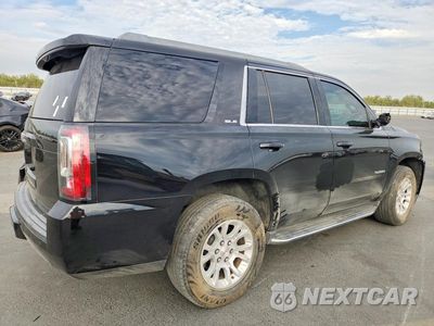 Trzecie zdjęcie samochodu z tyłu: 2016 GMC YUKON SLE VIN:1GKS1AKC3GR478331 - miniatura