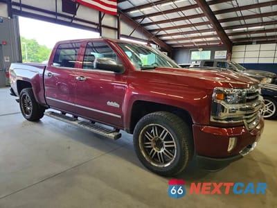Czwarte zdjęcie samochodu z boku: 2016 CHEVROLET SILVERADO K1500 HIGH COUNTRY VIN:3GCUKTEJ1GG255311 - miniatura