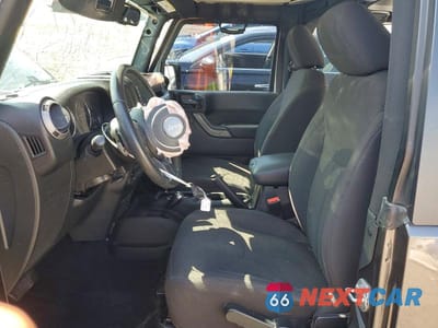 Zdjęcie 7 z 12 samochodu: 2017 JEEP WRANGLER SPORT VIN:1C4AJWAG2HL568129 - miniatura