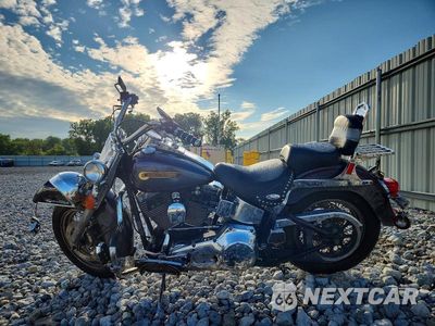 Trzecie zdjęcie samochodu z tyłu: 2004 HARLEY-DAVIDSON FLSTC VIN:1HD1BJY134Y067005 - miniatura