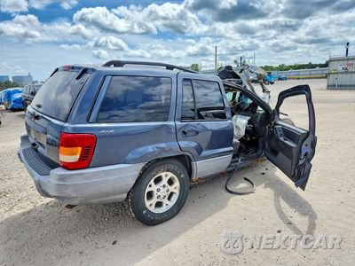 Trzecie zdjęcie samochodu z tyłu: 2000 JEEP GRAND CHEROKEE LAREDO VIN:1J4GW48S4YC409567 - miniatura