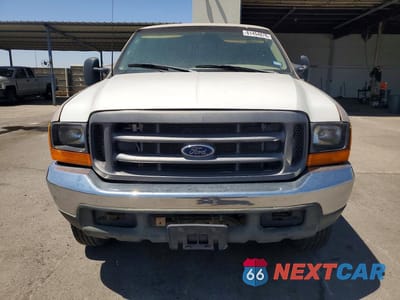 Piąte zdjęcie samochodu w środku: 1999 FORD F250 SUPER DUTY VIN:1FTNX21F7XEF09905 - miniatura