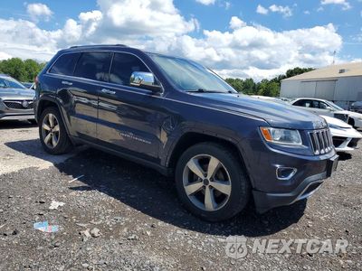 Czwarte zdjęcie samochodu z boku: 2014 JEEP GRAND CHEROKEE LIMITED VIN:1C4RJFBG3EC299460 - miniatura