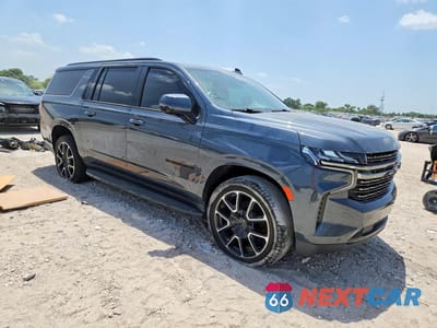 Czwarte zdjęcie samochodu z boku: 2021 CHEVROLET SUBURBAN C1500 RST VIN:1GNSCEKD7MR216787 - miniatura